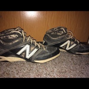New Balance metal baseball cleats (Size 11).
